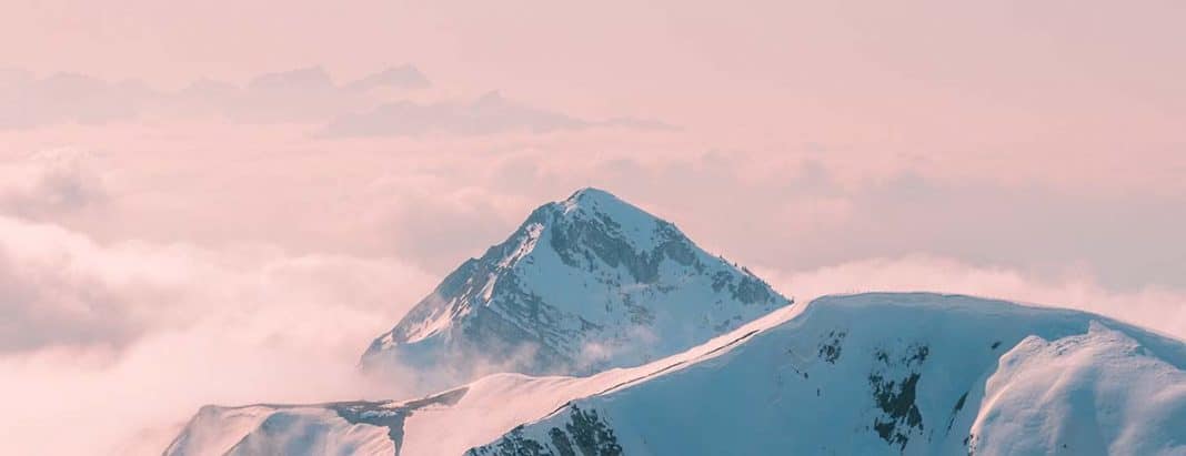 a mountain covered in fog