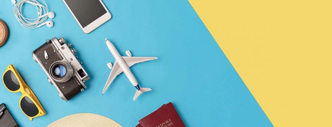 A plane, camera, and sunglases