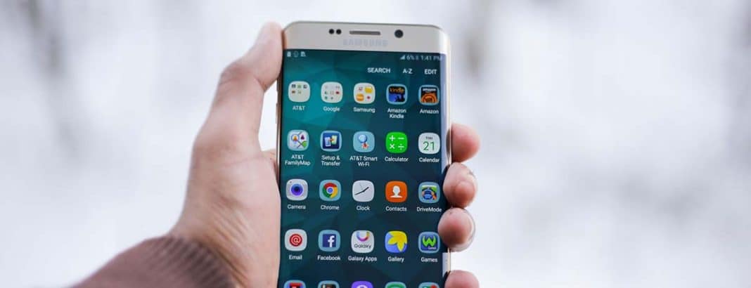 A person holding a Samsung Phone.