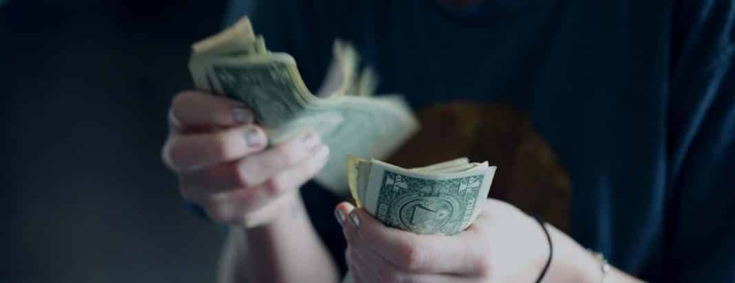 Somebody counting savings